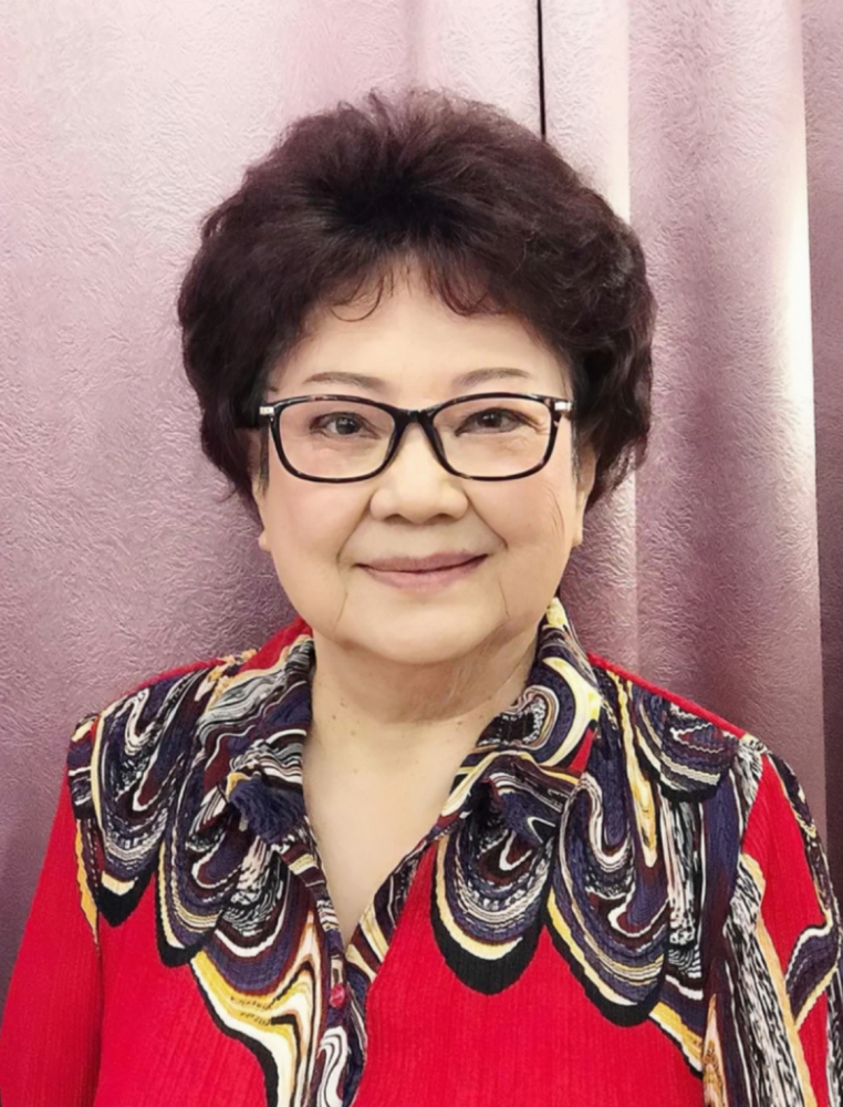 孟莉英老师从事志愿服务近30年 